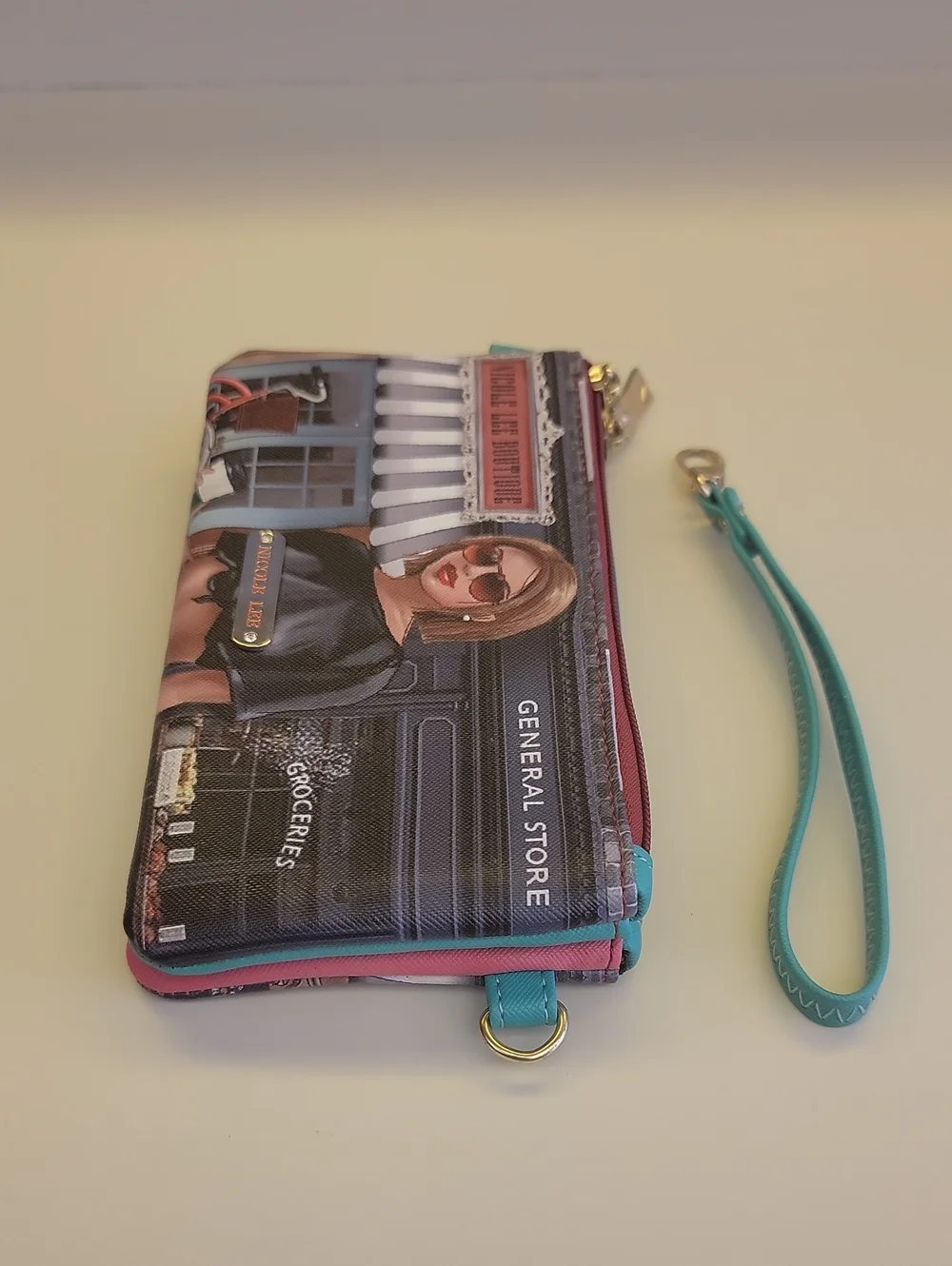 Nicole Lee Turquoise Multi-Panel Printed Wristlet